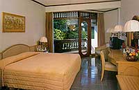 bedroom at melasti beach bungalow bali