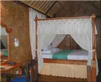 bedroom at agung raka bungalows ubud bali